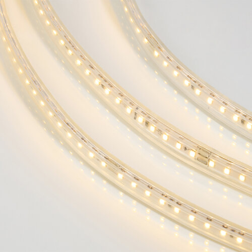 Светодиодная лента герметичная WOLTA WLS-220V-2835-10W/3000/S120 220В SMD2835 120led/м 10Вт/м 750лм/м 3000К IP65. Бобина 50 м., в комплекте: сетевой шнур, 2 заглушки, 2 коннектора, 2 фикс. клипсы. - фото 1.