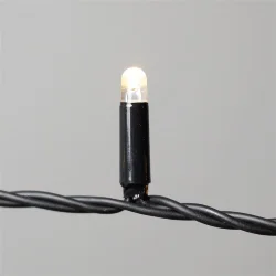 Гирлянда Нить с Колпачком 10м Тепло-Белая 220В, 100 LED, Провод Черный ПВХ, IP65