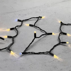 Гирлянда Нить с Колпачком 10м Тепло-Белая с Мерцанием Белого Диода 220В, 100 LED, Провод Черный ПВХ, IP65