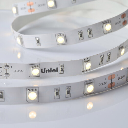 ULS-M22-5050-30LED/m-10mm-IP20-DC12V-7,2W/m-5M-3000K PROFI Гибкая светодиодная лента на самоклеящейся основе. Катушка 5м. в герметичной упаковке. Теплый белый свет(3000К) ТМ Uniel - фото