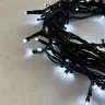 Гирлянда Нить 10м Белая 220В, 100 LED, Провод Черный ПВХ, IP54. Фото 2.