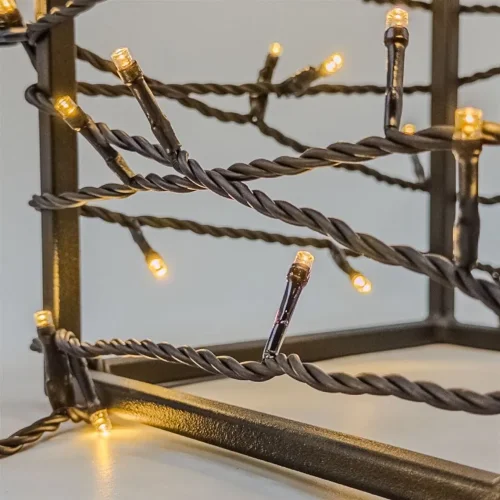 Гирлянда Нить 10м Тепло-Белая 220В, 100 LED, Провод Черный ПВХ, IP54. Фото 3.