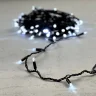Гирлянда Нить с Колпачком 10м Белая с Мерцанием Белого Диода 24В, 100 LED, Провод Черный ПВХ, IP65. Фото 6.
