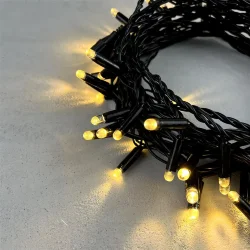 Гирлянда Нить с Колпачком 10м Тепло-Белая 24В, 100 LED, Провод Черный ПВХ, IP65