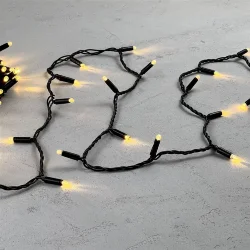 Гирлянда Нить с Колпачком 10м Тепло-Белая 24В, 100 LED, Провод Черный ПВХ, IP65