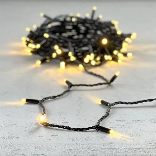 Гирлянда Нить с Колпачком 10м Тепло-Белая 24В, 100 LED, Провод Черный ПВХ, IP65. Фото 6.