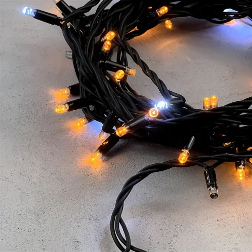 Гирлянда Нить 10м Желтая с Мерцанием Белого Диода 220В, 75 LED, Провод Черный Каучук, IP65. Фото 2.
