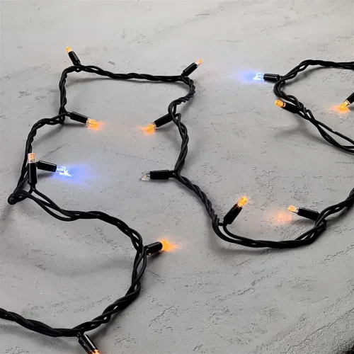 Гирлянда Нить 10м Желтая с Мерцанием Белого Диода 220В, 75 LED, Провод Черный Каучук, IP65. Фото 3.