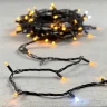 Гирлянда Нить 10м Желтая с Мерцанием Белого Диода 220В, 75 LED, Провод Черный Каучук, IP65. Фото 6.