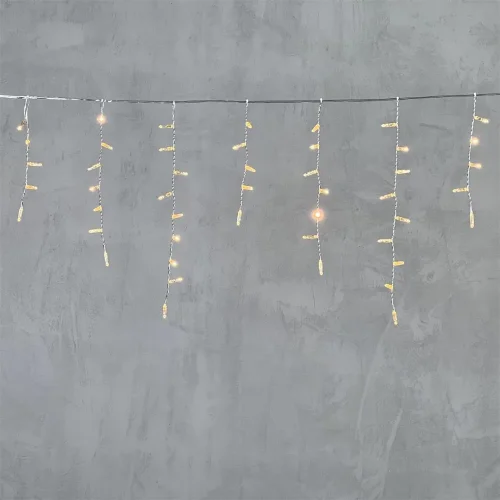 Гирлянда Бахрома с Колпачком 4,9 x 0,5 м Экстра Тепло-Белая 220В, 189 LED, Провод Прозрачный ПВХ, IP65. Фото 6.