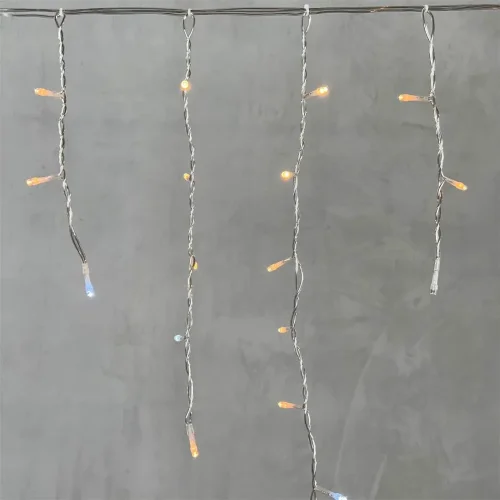 Гирлянда Бахрома 3,1 x 0,5 м Экстра Тепло-Белая с Мерцанием Белого Диода 220В, 150 LED, Провод Прозрачный ПВХ, IP54. Фото 2.