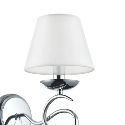 Светлые абажуры из ткани сочетаются с металлической арматурой в цвете хром и декоративными подвесками из стекла. Светильники Haley подходят для интерьеров в классическом стиле, например, для гостиных и спален. (Хром) - фото 5