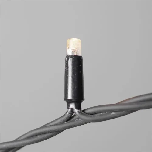 Гирлянда Нить 10м Тепло-Белая с Мерцанием Белого Диода 220В, 100 LED, Провод Черный Каучук, IP65. Фото 2.