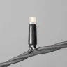 Гирлянда Нить 10м Тепло-Белая с Мерцанием Белого Диода 220В, 100 LED, Провод Черный Каучук, IP65. Фото 2.