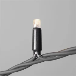 Гирлянда Нить 10м Тепло-Белая с Мерцанием Белого Диода 220В, 100 LED, Провод Черный Каучук, IP65