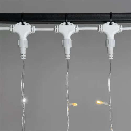 Гирлянда Занавес 2 x 2 м Желтый с Мерцанием Белого Диода 220В, 400 LED, Провод Прозрачный ПВХ, IP54. Фото 3.