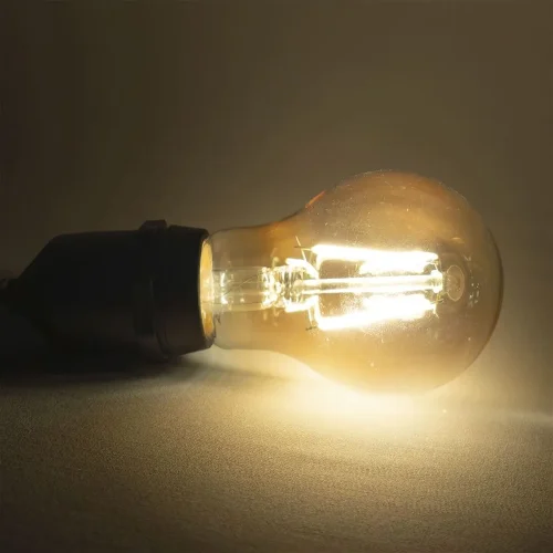 Лампа Филаментная Классика A60 220В, Цоколь E27, 1Вт, Тепло-белая, 2700К. Фото 4.