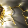 Гирлянда Нить 10м Тепло-Белая 24В, 100 LED, Провод Золотой Каучук 2,3мм, IP65. Фото 4.