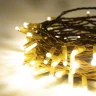 Гирлянда Нить 10м Тепло-Белая 220В, 100 LED, Провод Золотой Каучук 2,3мм, IP65. Фото 3.