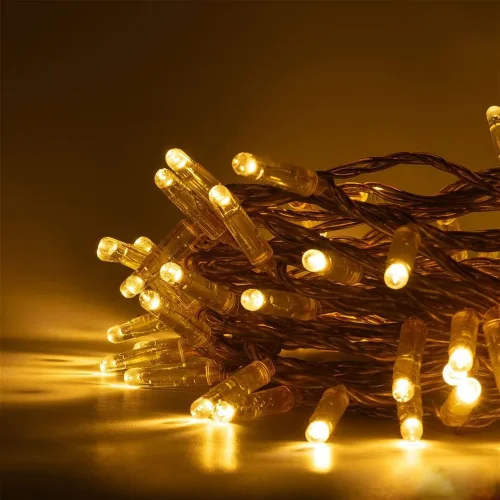 Гирлянда Нить с Колпачком 10м Тепло-Белая 24В, 100 LED, Провод Золотой ПВХ, IP65. Фото 3.