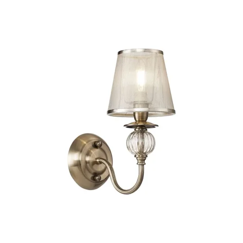 Серия в классическом стиле. Главное украшение светильников Inessa – декоративные элементы арматуры из прозрачного стекла коньячного оттенка. Абажуры выполнены из органзы и обрамлены тесьмой в цвет арматуры, сделанной из металла. Широкая линейка позволит о