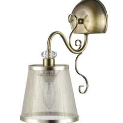 Серия из металла цвета античной бронзы. Арматура светильников Driana дополнена завитками на рожках и узогнутым декором в центральной части. Абажуры из полупрозрачной органзы выполнены в виде колокольчиков и обрамлены ободками из металла. (Бронза Антик)