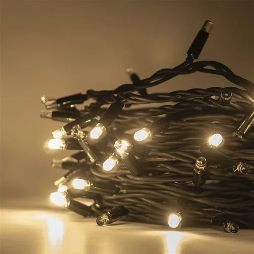 Гирлянда Нить 10м Тепло-Белая с Мерцанием Каждого Диода 220В, 100 LED, Провод Черный Каучук, IP65. Фото 3.
