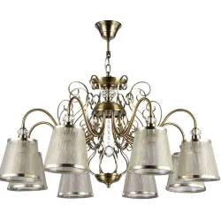 Серия из металла цвета античной бронзы. Арматура светильников Driana дополнена завитками на рожках и узогнутым декором в центральной части. Абажуры из полупрозрачной органзы выполнены в виде колокольчиков и обрамлены ободками из металла. (Бронза Антик)