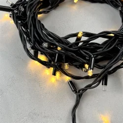 Гирлянда Нить 10м Тепло-Белая с Мерцанием Каждого Диода 220В, 75 LED, Провод Черный Каучук, IP65