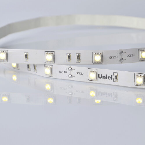 ULS-M22-5050-30LED/m-10mm-IP20-DC12V-7,2W/m-5M-4000K PROFI Гибкая светодиодная лента на самоклеящейся основе. Катушка 5м. в герметичной упаковке. Белый свет(4000К) ТМ Uniel - фото