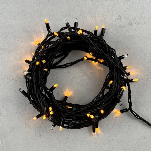Гирлянда Нить 10м Желтая с Мерцанием Каждого Диода 220В, 75 LED, Провод Черный Каучук, IP65. Фото 1.