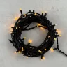 Гирлянда Нить 10м Желтая с Мерцанием Каждого Диода 220В, 75 LED, Провод Черный Каучук, IP65. Фото 1.
