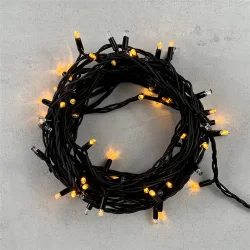 Гирлянда Нить 10м Желтая с Мерцанием Каждого Диода 220В, 75 LED, Провод Черный Каучук, IP65