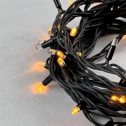 Гирлянда Нить 10м Желтая с Мерцанием Каждого Диода 220В, 75 LED, Провод Черный Каучук, IP65