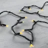 Гирлянда Нить 10м Золотой, 75 LED, Провод Черный Каучук, IP65. Фото 3.