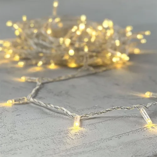 Гирлянда Нить с Колпачком 10м Тепло-Белая 24В, 100 LED, Провод Прозрачный ПВХ, IP65. Фото 6.