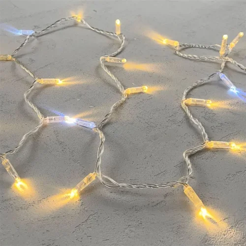 Гирлянда Нить с Колпачком 10м Тепло-Белая с Мерцанием Белого Диода 24В, 100 LED, Провод Прозрачный ПВХ, IP65. Фото 3.