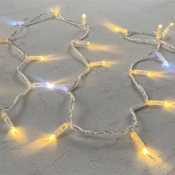 Гирлянда Нить с Колпачком 10м Тепло-Белая с Мерцанием Белого Диода 24В, 100 LED, Провод Прозрачный ПВХ, IP65