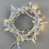 Гирлянда Нить 10м Тепло-Белая с Мерцанием Белого Диода 220В, 75 LED, Провод Белый Каучук, IP65. Фото 1.