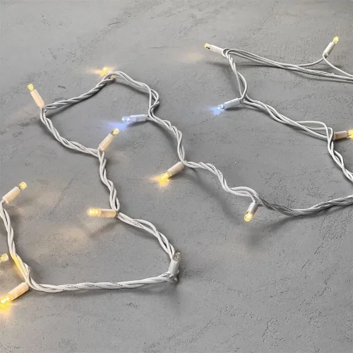 Гирлянда Нить 10м Тепло-Белая с Мерцанием Белого Диода 220В, 75 LED, Провод Белый Каучук, IP65. Фото 3.