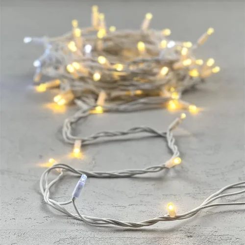 Гирлянда Нить 10м Тепло-Белая с Мерцанием Белого Диода 220В, 75 LED, Провод Белый Каучук, IP65. Фото 6.