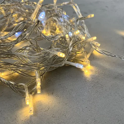 Гирлянда Нить 10м Тепло-Белая с Мерцанием Белого Диода 24В, 100 LED, Провод Прозрачный ПВХ, IP54. Фото 2.