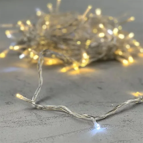 Гирлянда Нить 10м Тепло-Белая с Мерцанием Белого Диода 24В, 100 LED, Провод Прозрачный ПВХ, IP54. Фото 6.
