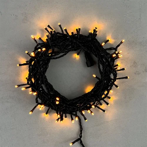 Гирлянда Нить 10м Экстра Тепло-Белая 24В, 100 LED, Провод Черный ПВХ, IP54. Фото 1.