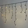 Гирлянда Бахрома 3,1 x 0,5 м Тепло-Белая 220В, 120 LED, Провод Черный Каучук 2,3мм, IP65. Фото 2.