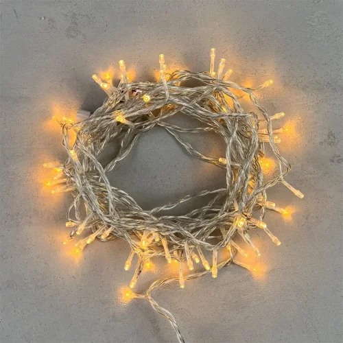 Гирлянда Нить 10м Экстра Тепло-Белая 24В, 100 LED, Провод Прозрачный ПВХ, IP54. Фото 1.