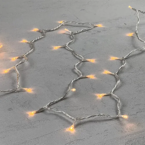 Гирлянда Нить 10м Экстра Тепло-Белая 24В, 100 LED, Провод Прозрачный ПВХ, IP54. Фото 3.