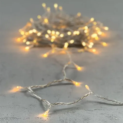 Гирлянда Нить 10м Экстра Тепло-Белая 24В, 100 LED, Провод Прозрачный ПВХ, IP54. Фото 6.