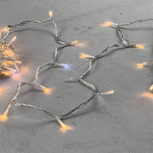 Гирлянда Нить 10м Экстра Тепло-Белая с Мерцанием Белого Диода 24В, 100 LED, Провод Прозрачный ПВХ, IP54. Фото 3.