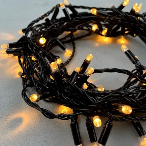 Гирлянда Нить с Колпачком 10м Экстра Тепло-Белая 24В, 100 LED, Провод Черный ПВХ, IP65. Фото 2.